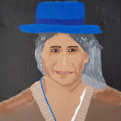 Schilderij “Met een blauwe hoed”